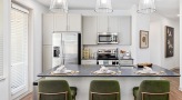 c-shaped kitchen with seating at open counter
