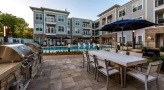 grilling and eating area next to pool