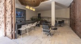 covered patio with kitchen