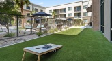 game lawn with corn hole