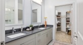 a bathroom with double sink vanity