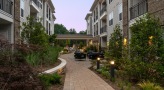 a brick walkway and outdoor amenities at Overture Cotswold