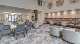 large well lit lounge with ample seating
