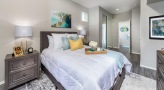 bedroom with nightstands and lamps