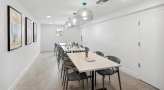 art room with tables and chairs