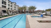 swimming pool and jacuzzi with chair lift