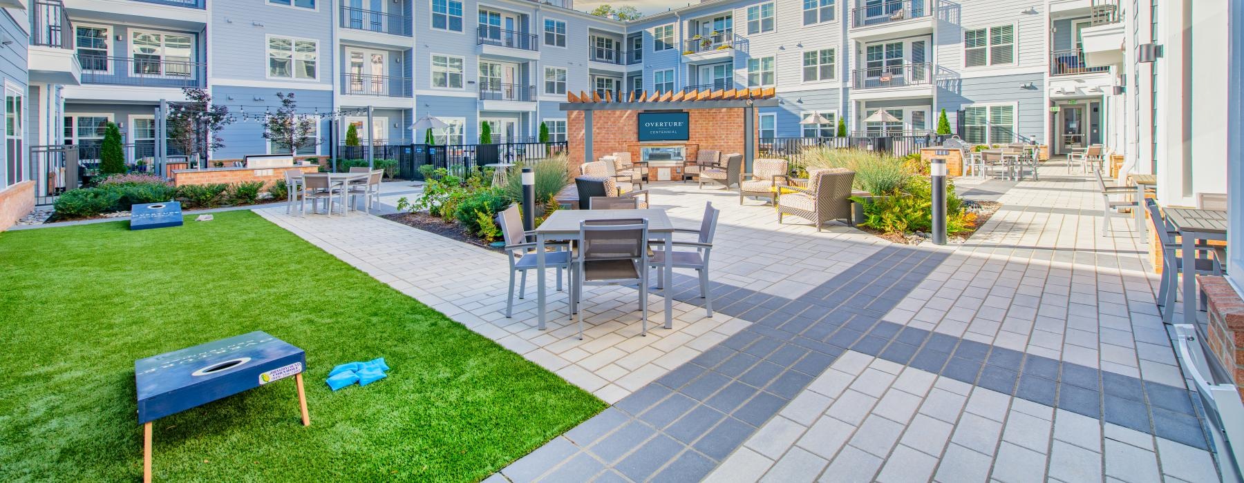 Outdoor lounge at Overture Centennial senior living apartments in Raleigh, NC, featuring outdoor furniture.