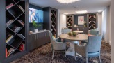 lounge area with tables and a tv
