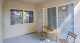 patio with a table and chairs