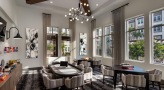 Large game room with poker tables and board games