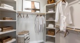 large closet with custom shelving
