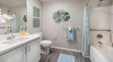 bathroom with a large mirror