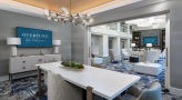 Spacious well lit lobby area with multiple areas for seating