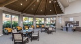 Large open lounge with large windows and ample seating