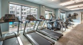 fitness center with large windows