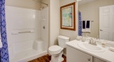 bathroom with a large mirror
