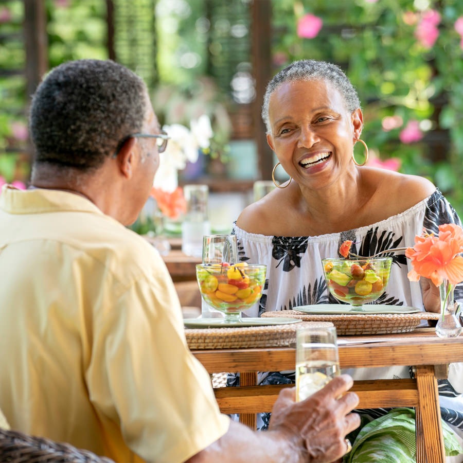 Atlanta Senior couple enjoying lunch on an outdoor patio