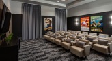 large movie room with leather recliners