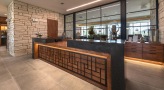 Lobby area with large wooden desk 