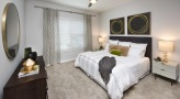 spacious bedrooms with oversized windows