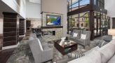 tv above fireplace in clubhouse
