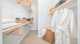 large closet with custom shelving