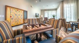 social room with tables and chairs