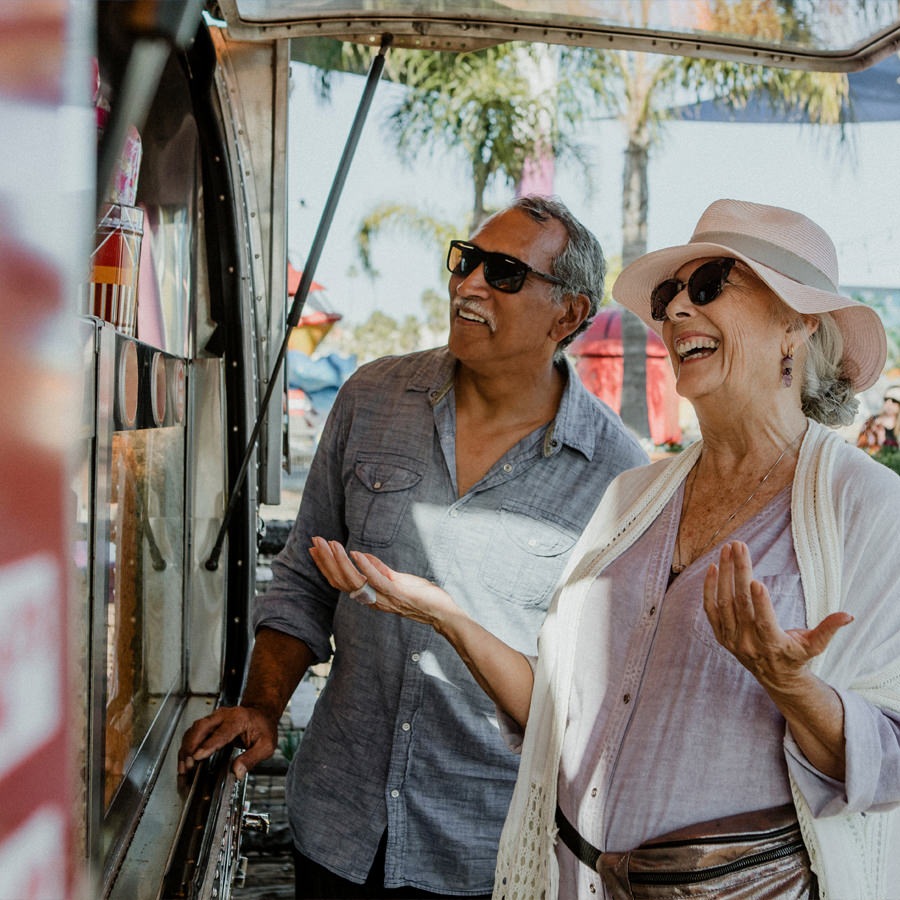 Southern California A senior couple orders food from a food truck.