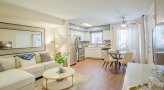 kitchen and dining area with a large window
