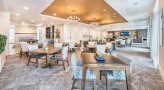 Well lit lounge with plenty of seating 
